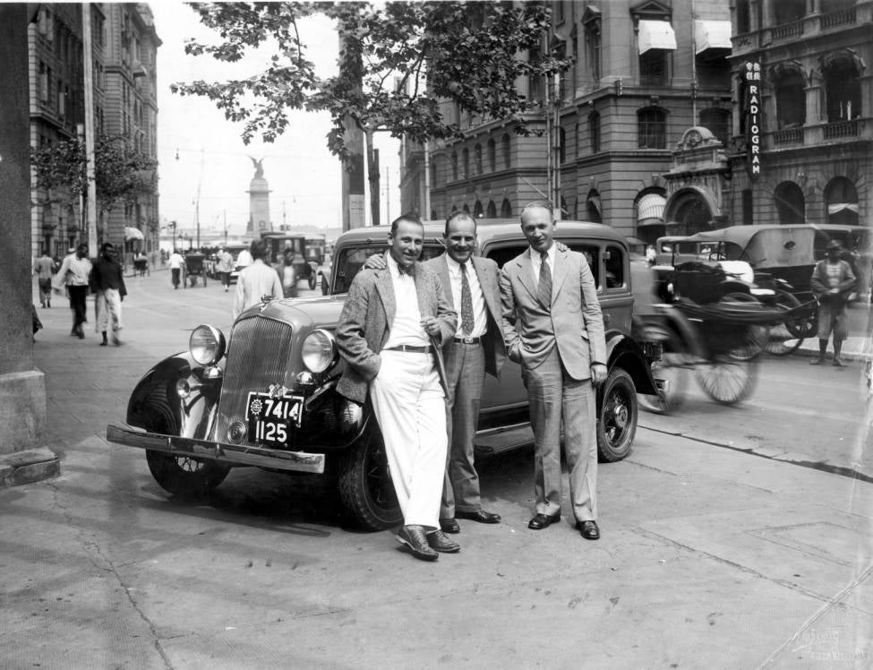 Mark Moody Major Jimmy Doolittle Bruce M Smith in front of automobile in Shanghai