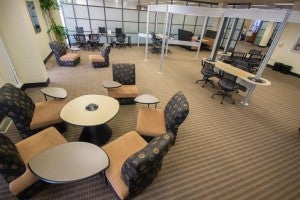 Tables and chairs in the Norris Medical Library Exchange