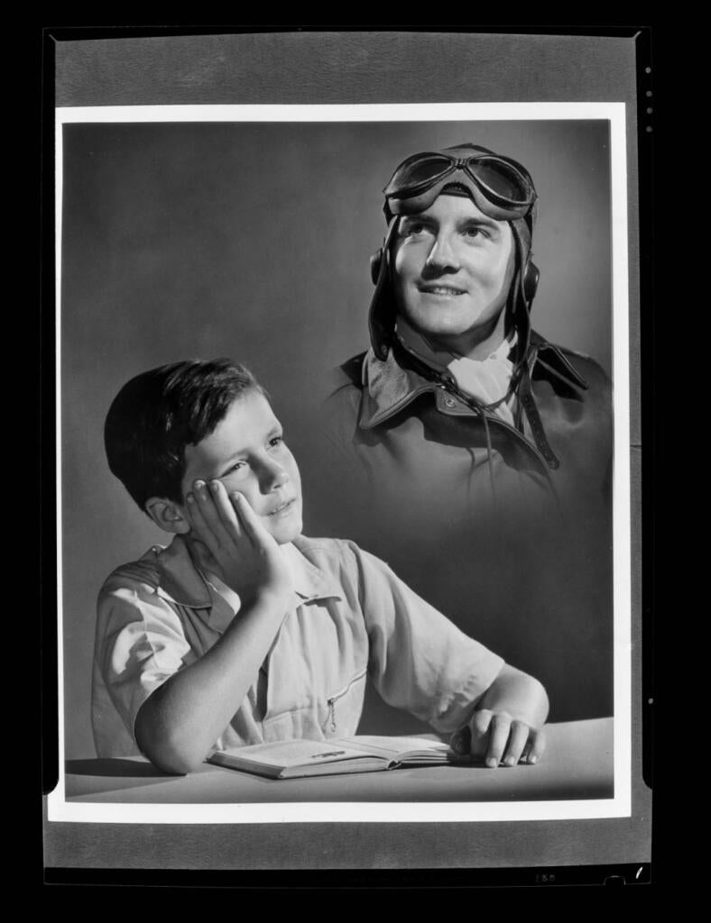 Boy thinking about soldier, 1942