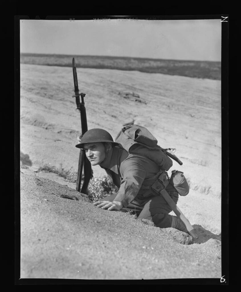 Man posing as soldier, 1942