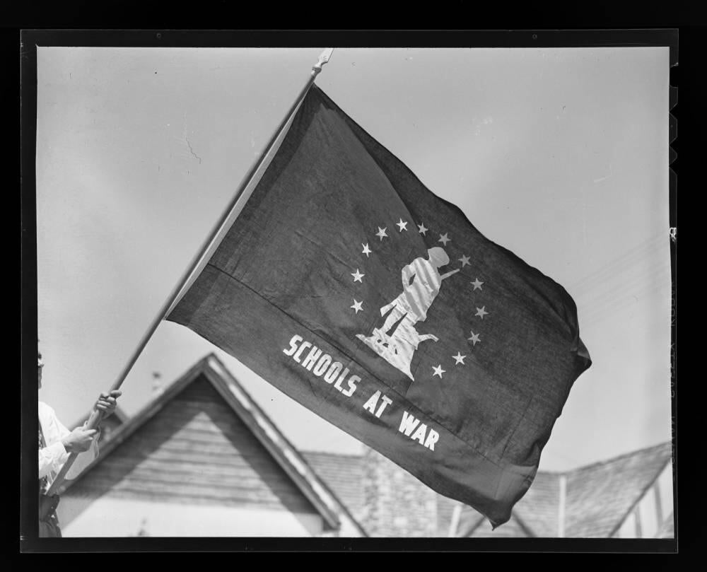 Schools at war flag awarded to schools that met war bond sales goals, 1943